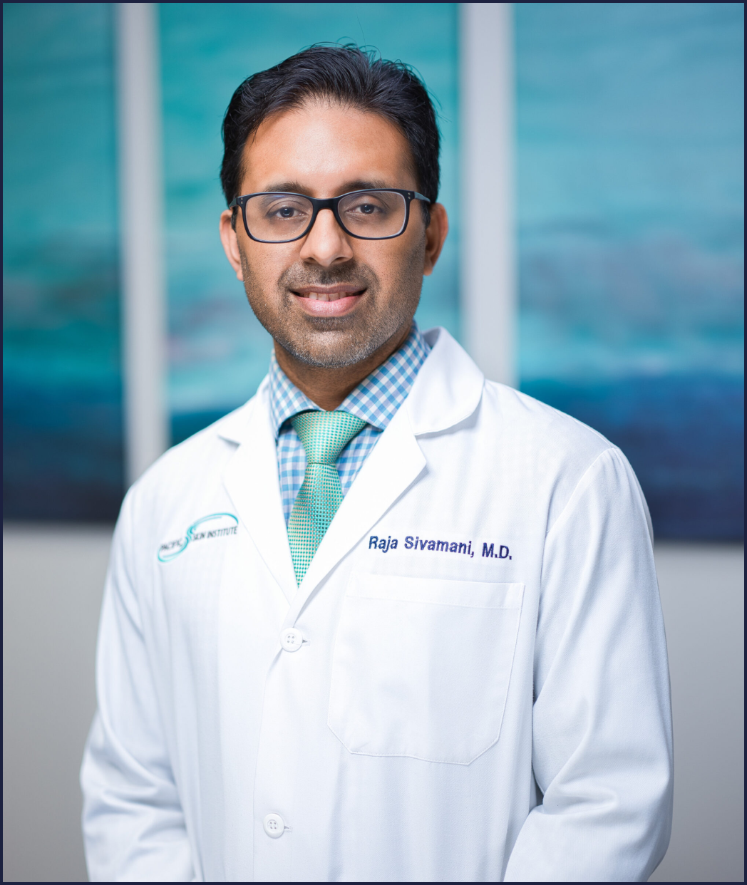 Dr. Sivamani in a white lab coat.